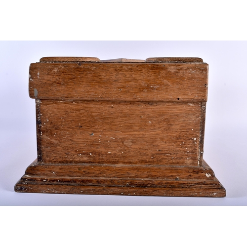 576 - AN ANTIQUE FOLK ART CARVED WOOD CASKET. 40 cm x 18 cm x 28 cm.