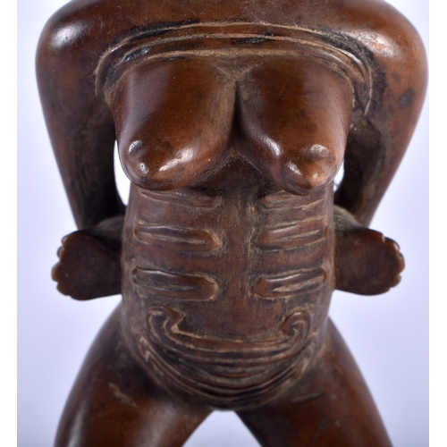 579 - A LOVELY AFRICAN TRIBAL CARVED WOOD FERTILITY FIGURE. 16cm high.