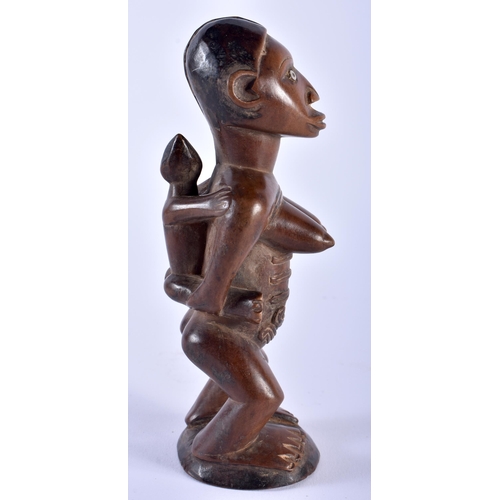 579 - A LOVELY AFRICAN TRIBAL CARVED WOOD FERTILITY FIGURE. 16cm high.