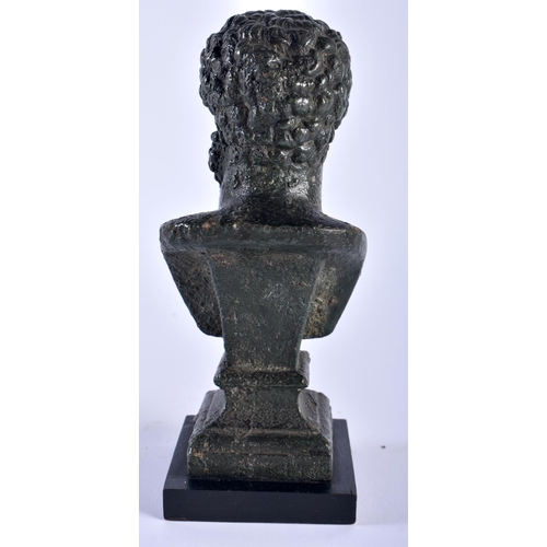 581 - A BRONZED CERAMIC BUST OF MARCUS AURELIUS After the Antiquity. 17 cm high.