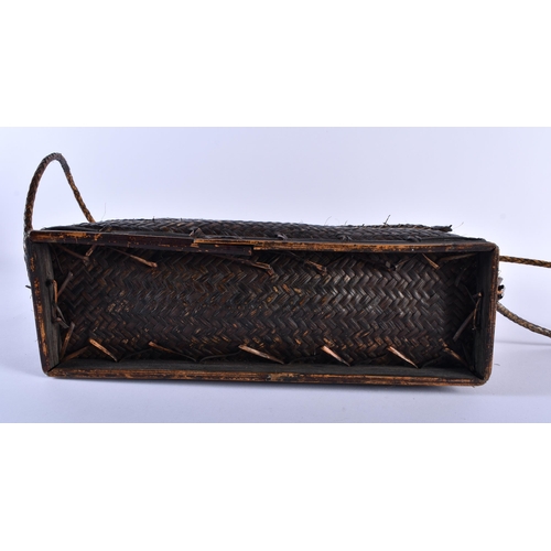 587 - TWO TRIBAL WICKER BAGS. Largest 30 cm x 34 cm. (2)