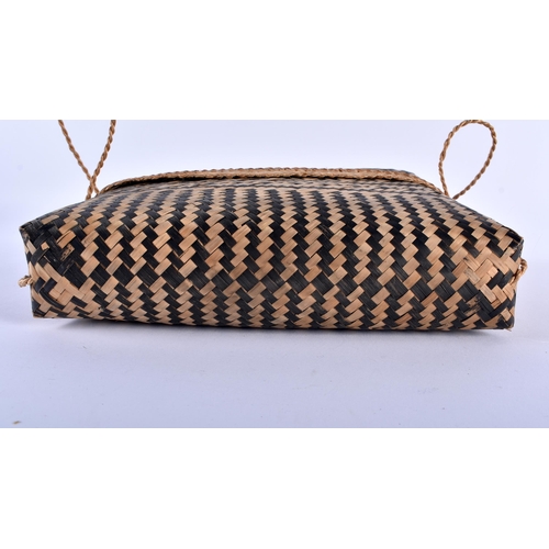 587 - TWO TRIBAL WICKER BAGS. Largest 30 cm x 34 cm. (2)