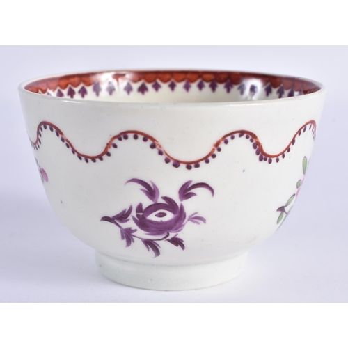 59 - AN 18TH CENTURY WORCESTER TEABOWL AND SAUCER painted with purple flowers under a flowing ribbon.11 c... 