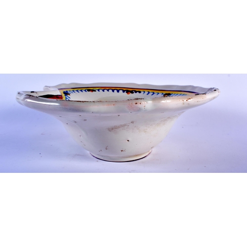 591 - AN ANTIQUE FRENCH FAIENCE BARBERS BOWL. 30 cm x 24 cm.