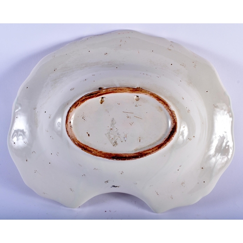 591 - AN ANTIQUE FRENCH FAIENCE BARBERS BOWL. 30 cm x 24 cm.