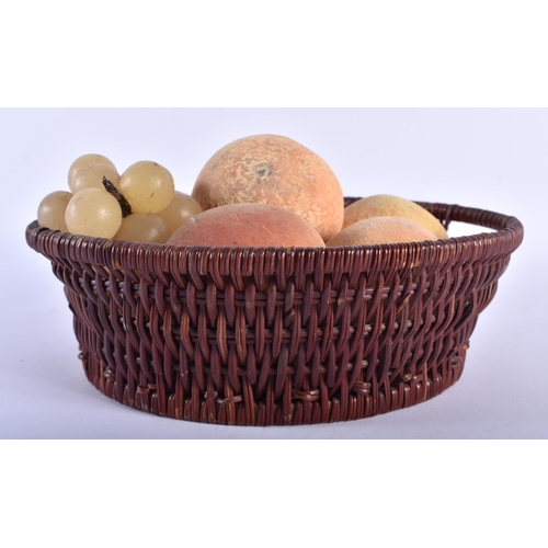 593 - A BASKET OF CERAMIC AND ALABASTER FAUX FRUIT. Bowl 21 cm diameter. (qty)