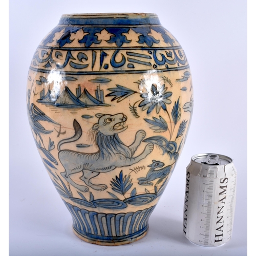 599 - A LARGE 19TH CENTURY PERSIAN ISLAMIC BLUE GLAZED VASE painted with animals and scripture. 30 cm x 18... 