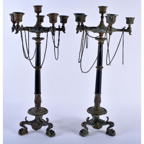 604 - A PAIR OF 19TH CENTURY FRENCH EMPIRE STYLE BRONZE CANDLESTICKS. 48cm x 18 cm.