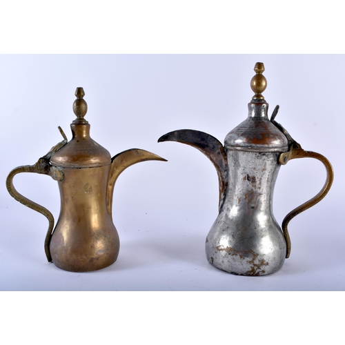 608 - THREE 19TH CENTURY MIDDLE EASTERN ISLAMIC EWERS in various forms and sizes. Largest 34 cm x 22cm. (3... 