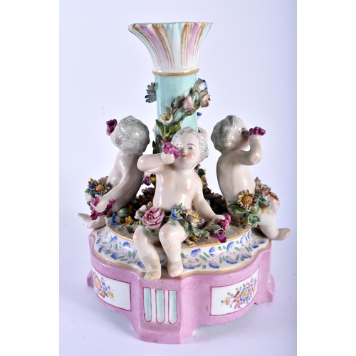 610 - A LARGE 19TH CENTURY GERMAN MEISSEN STYLE PORCELAIN CENTREPIECE formed with putti. 25cm x 15 cm.