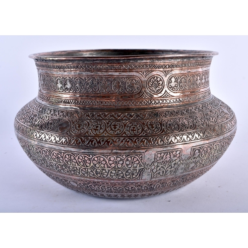 614 - A 19TH CENTURY MIDDLE EASTERN ISLAMIC TINNED COPPER BOWL possibly Syrian, decorated with bands of fo... 