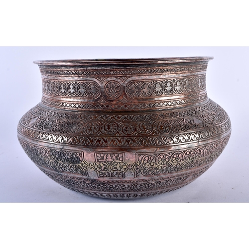 614 - A 19TH CENTURY MIDDLE EASTERN ISLAMIC TINNED COPPER BOWL possibly Syrian, decorated with bands of fo... 