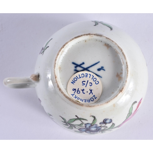 62 - A FINE 18TH CENTURY WORCESTER TEACUP AND SAUCER Attributed to James Giles, painted with floral spray... 