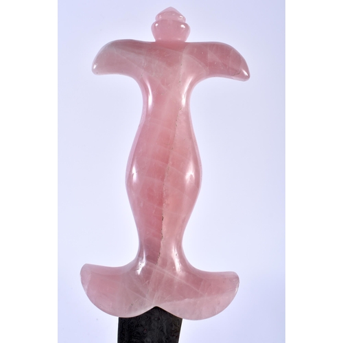 625 - A MIDDLE EASTERN CARVED ROSE QUARTZ HANDLED NIELLO DAGGER. 35 cm long.