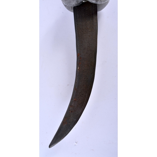 626 - A MIDDLE EASTERN CARVED AGATE RAMS HEAD HANDLED NIELLO DAGGER. 35 cm long.