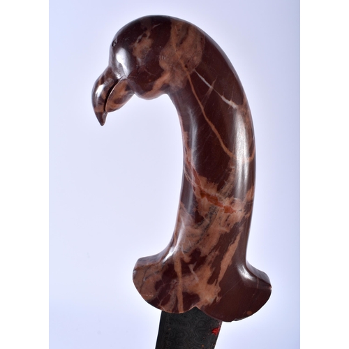 627 - A MIDDLE EASTERN CARVED AGATE BIRD HEAD HANDLED NIELLO DAGGER. 35 cm long.