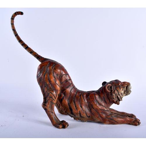 629 - A CONTINENTAL COLD PAINTED BRONZE FIGURE OF A REARING TIGER modelled outstretched. 27 cm x 24 cm.