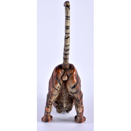 629 - A CONTINENTAL COLD PAINTED BRONZE FIGURE OF A REARING TIGER modelled outstretched. 27 cm x 24 cm.