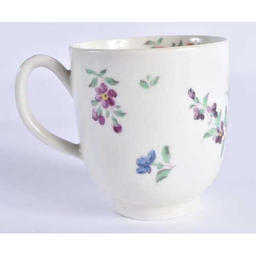 63 - AN 18TH CENTURY WORCESTER COFFEE CUP AND SAUCER painted with floral sprays. 12 cm wide. (2)