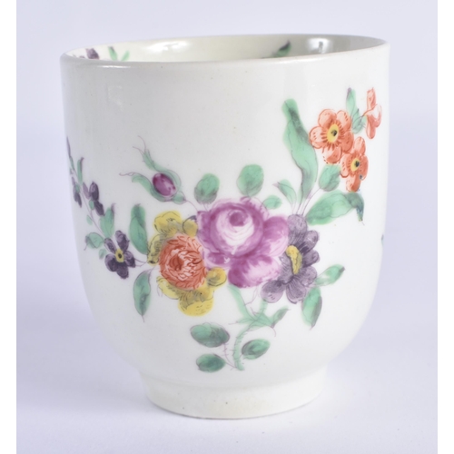 63 - AN 18TH CENTURY WORCESTER COFFEE CUP AND SAUCER painted with floral sprays. 12 cm wide. (2)