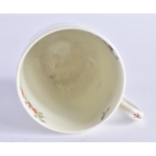 63 - AN 18TH CENTURY WORCESTER COFFEE CUP AND SAUCER painted with floral sprays. 12 cm wide. (2)