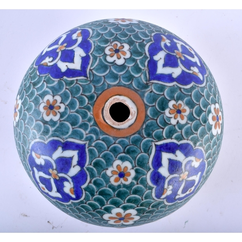 631 - A TURKISH KUTAHYA POTTERY HANGING MOSQUE BALL. 18 cm wide.