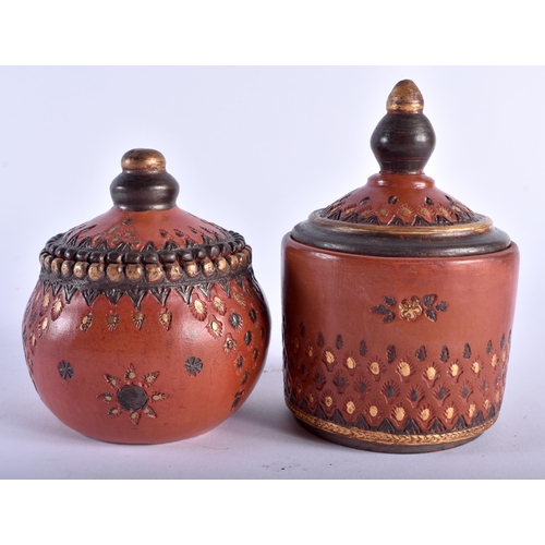 632 - TWO TURKISH OTTOMAN POTTERY TOPHANE JARS AND COVERS. Largest 12.5 cm high. (2)