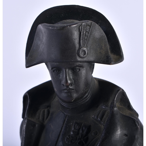 635 - AN ANTIQUE BRONZE FIGURE OF NAPOLEON. 22cm high.