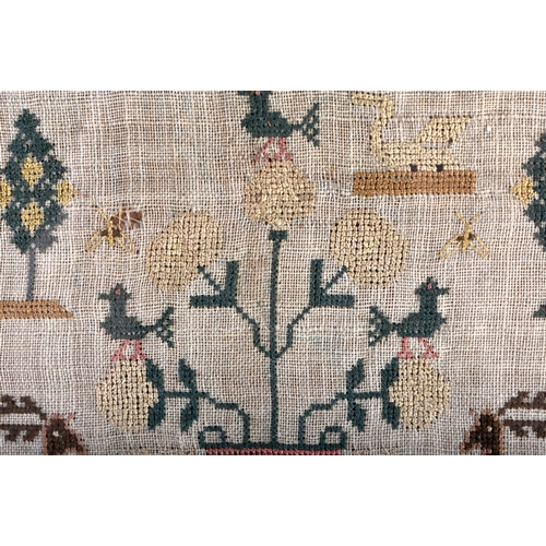 655 - A FRAMED ANTIQUE EMBROIDERED SAMPLER depicting animals and foliage. 36 cm square.