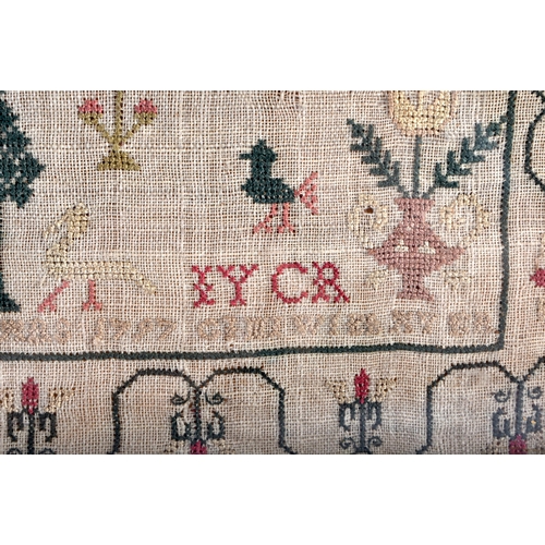 655 - A FRAMED ANTIQUE EMBROIDERED SAMPLER depicting animals and foliage. 36 cm square.