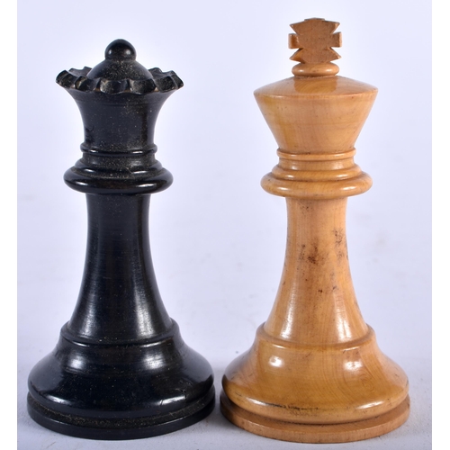 657 - AN ANTIQUE BOX AND EBONY CHESS SET together with gaming board and counters. (qty)