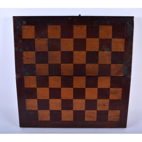 657 - AN ANTIQUE BOX AND EBONY CHESS SET together with gaming board and counters. (qty)