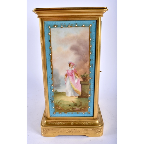 659 - A LATE 19TH CENTURY FRENCH SEVRES PORCELAIN INSET MANTEL CLOCK painted with lovers in landscapes. 25... 