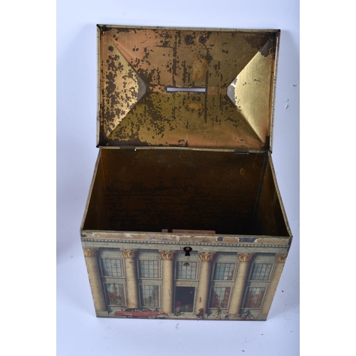 663 - AN UNUSUAL ANTIQUE BISCUIT TIN MONEY BOX together with a spelter equestrian desk stand. Largest 15 c... 