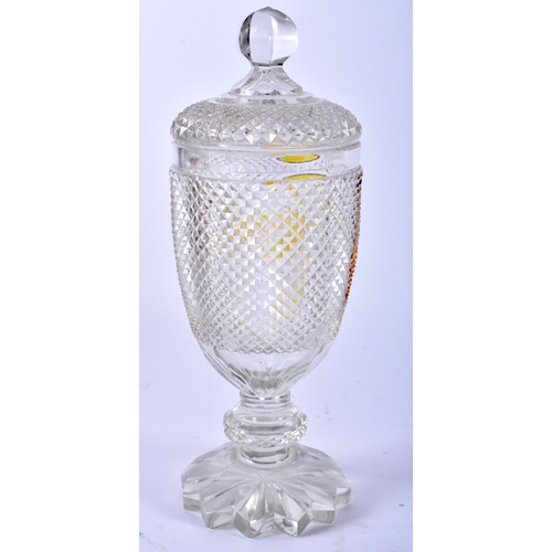 667 - AN ANTIQUE BOHEMIAN GLASS VASE AND COVER. 22cm high.