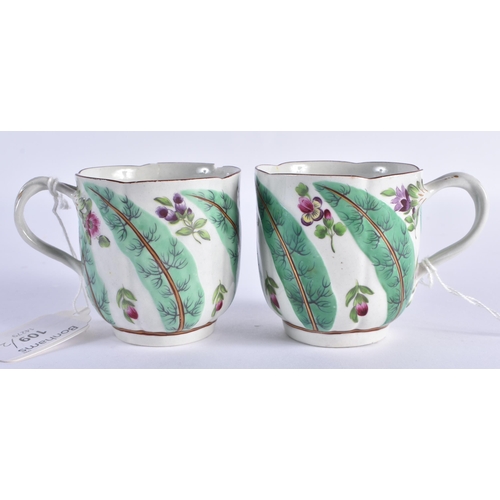 66 - TWO RARE 18TH CENTURY WORCESTER FLUTED COFFEE CUPS and one matching saucer, painted with flowers and... 