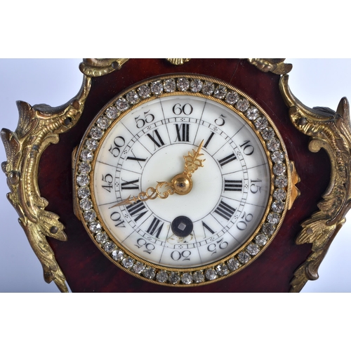 675 - AN ANTIQUE FRENCH BOULLE CLOCK. 28 cm high.