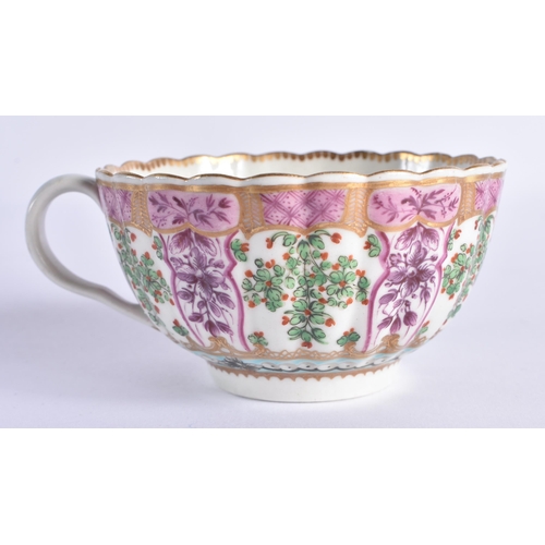 68 - AN 18TH CENTURY WORCESTER PORCELAIN FLUTED TEACUP AND SAUCER painted with puce trailing flowers unde... 