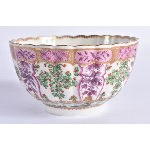 68 - AN 18TH CENTURY WORCESTER PORCELAIN FLUTED TEACUP AND SAUCER painted with puce trailing flowers unde... 