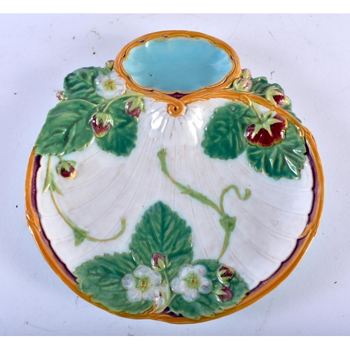 681 - AN ANTIQUE MINTON MAJOLICA OYSTER DISH together with a faience albarello jar. Largest 29 cm high. (2... 