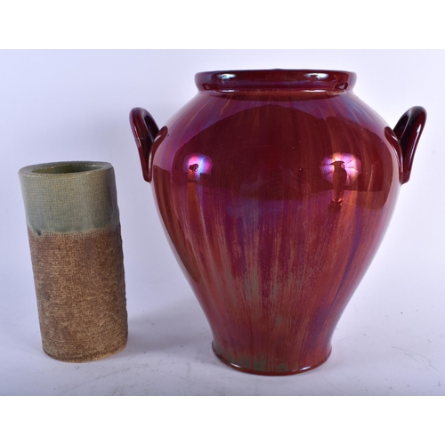 682 - AN ART DECO FLAMBE GLAZED VASE together with a studio pottery vase. Largest 24 cm x 20 cm. (2)