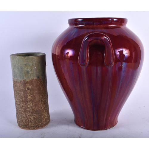 682 - AN ART DECO FLAMBE GLAZED VASE together with a studio pottery vase. Largest 24 cm x 20 cm. (2)