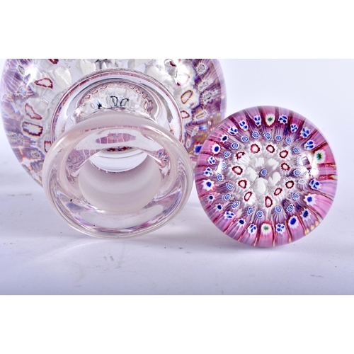 685 - A MILLEFIORI GLASS PAPERWEIGHT. 15 cm x 9 cm.