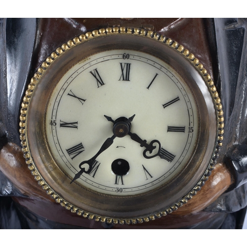 689 - A LARGE EARLY 20TH CENTURY COLD PAINTED CLOCK OF A MALE modelled with a dial inside his stomach. 38 ... 