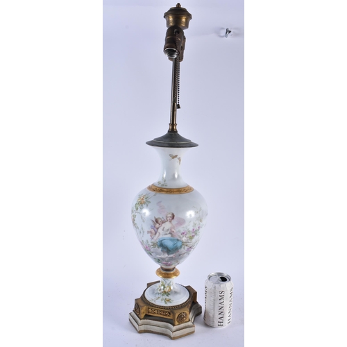 690 - A LARGE LATE 19TH CENTURY FRENCH SEVRES STYLE PORCELAIN LAMP painted with figures amongst foliage. 6... 