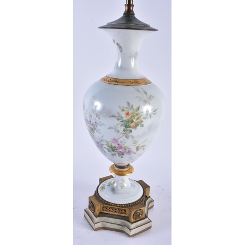 690 - A LARGE LATE 19TH CENTURY FRENCH SEVRES STYLE PORCELAIN LAMP painted with figures amongst foliage. 6... 