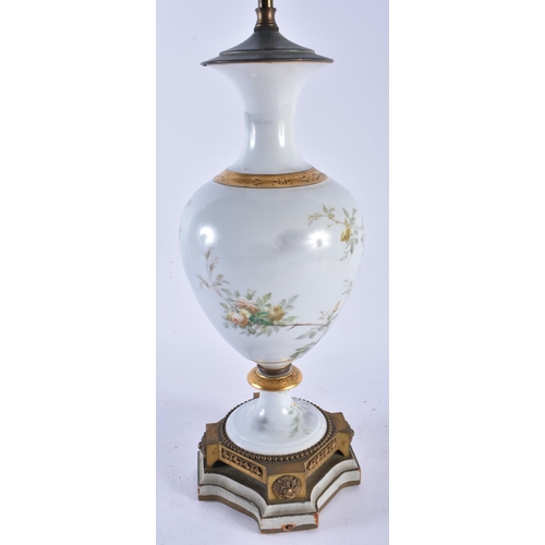 690 - A LARGE LATE 19TH CENTURY FRENCH SEVRES STYLE PORCELAIN LAMP painted with figures amongst foliage. 6... 