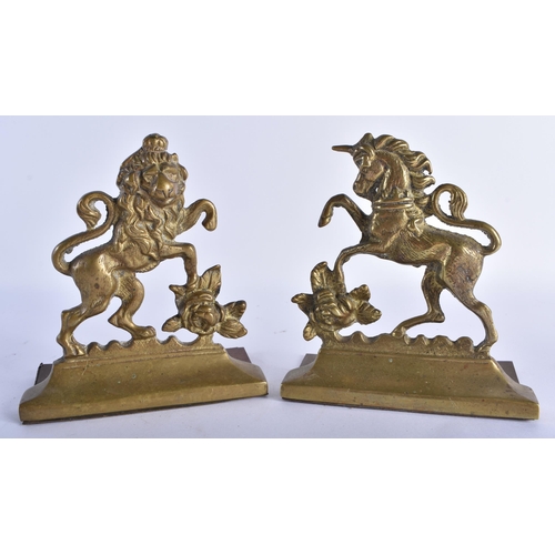 693 - THREE VICTORIAN BRONZE DOOR STOPS formed as animals. Largest 21 cm x 18 cm. (3)