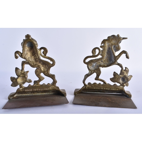 693 - THREE VICTORIAN BRONZE DOOR STOPS formed as animals. Largest 21 cm x 18 cm. (3)