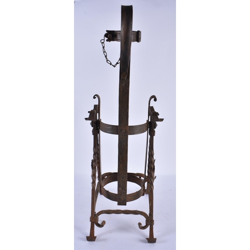 695 - AN ANTIQUE GERMAN CAST IRON ASBACH URAIT WHISKEY DISPENSER. 54 cm high.